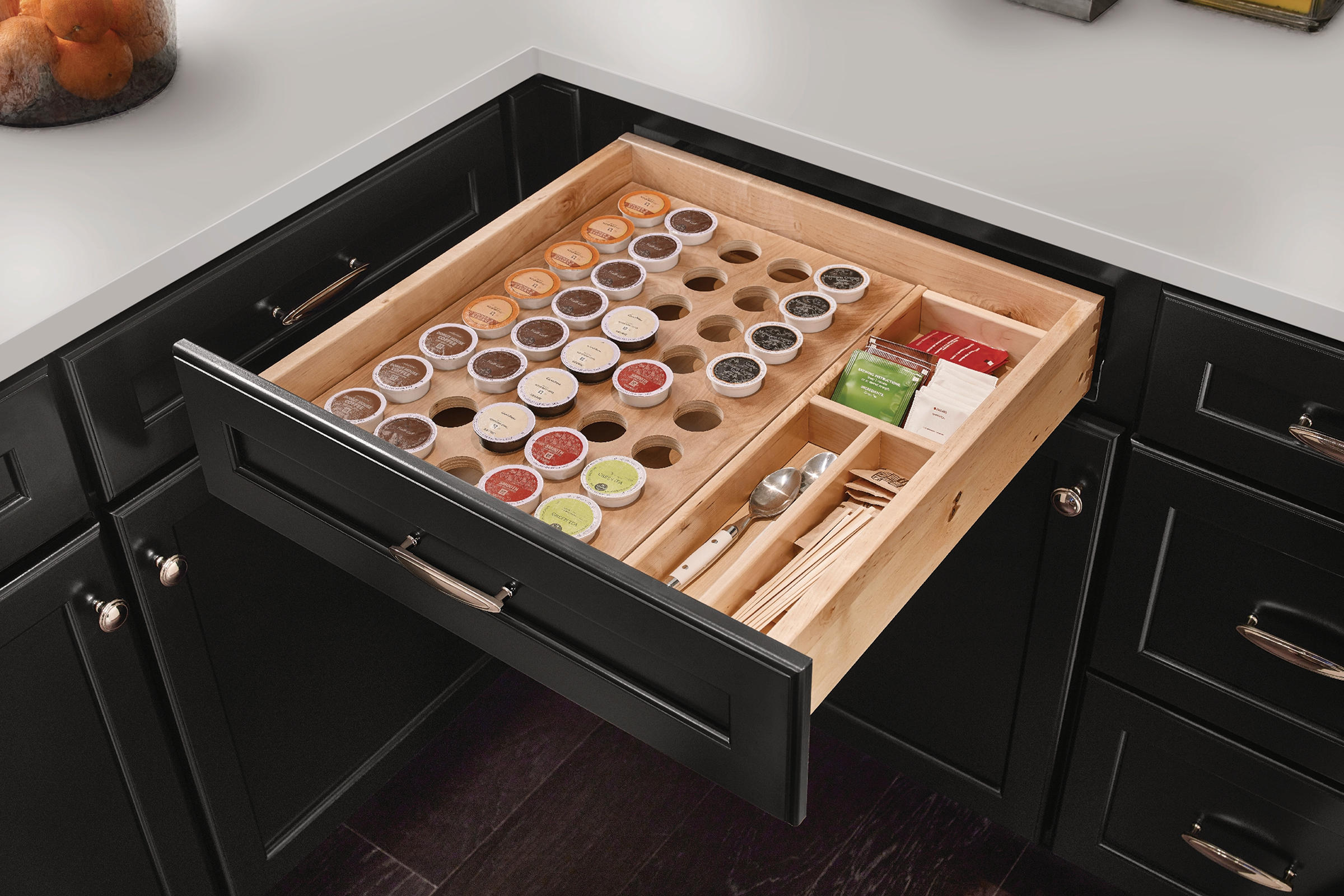 Cabinet drawer used as coffee and tea station by inserting KraftMaid K-Cup Organizer Drawer insert