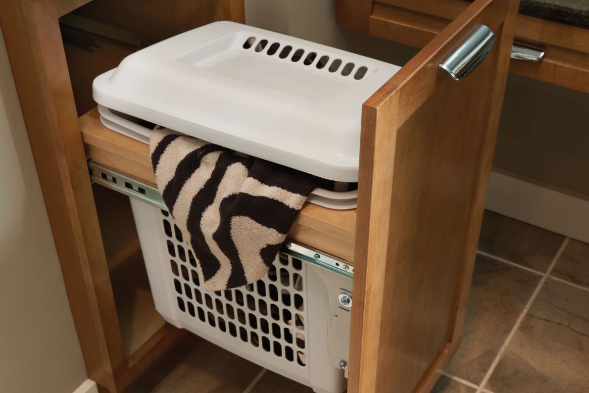 KraftMaid pull-out laundry hamper cabinet