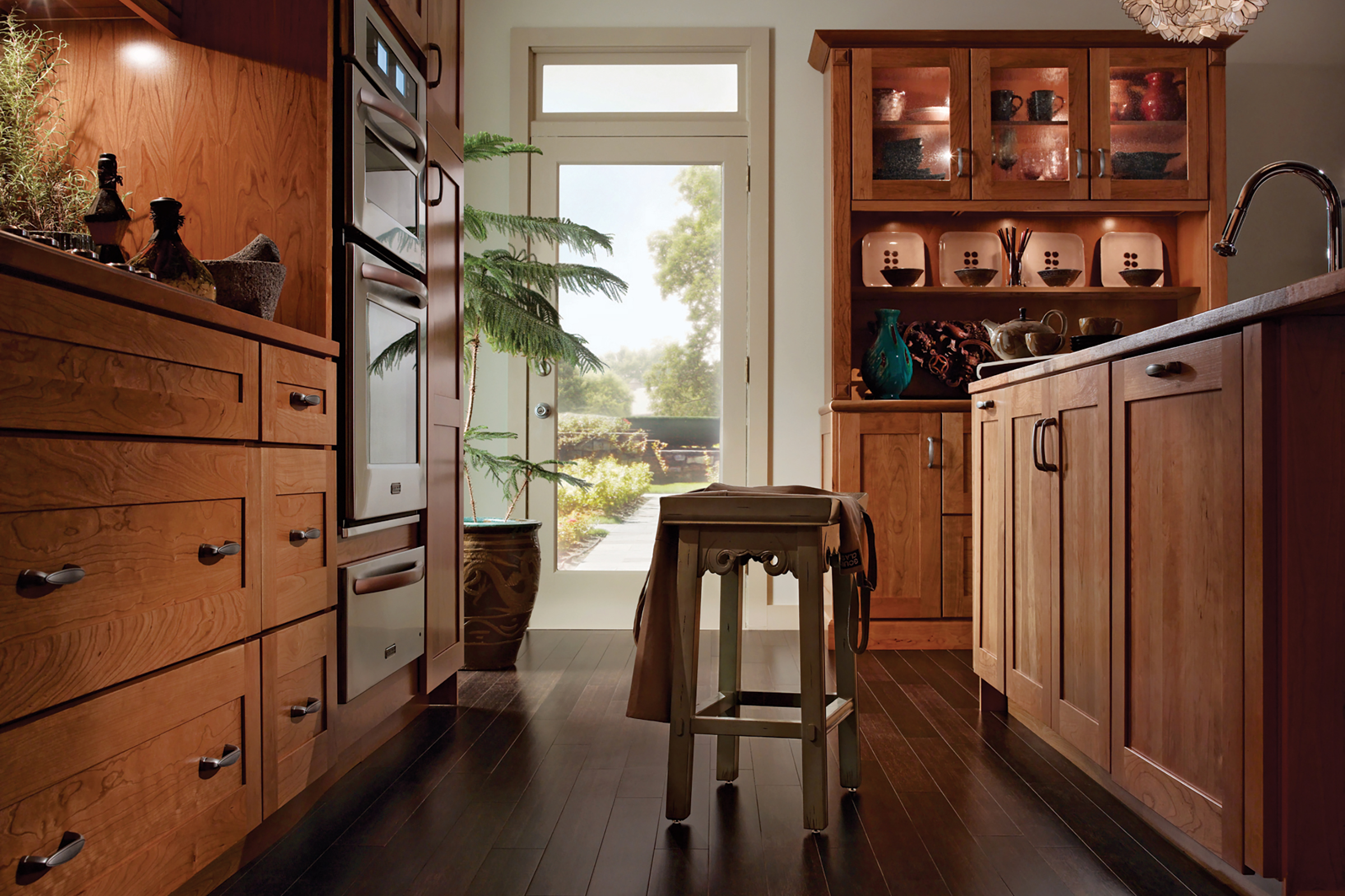 KraftMaid wood Shaker kitchen cabinets with natural finish