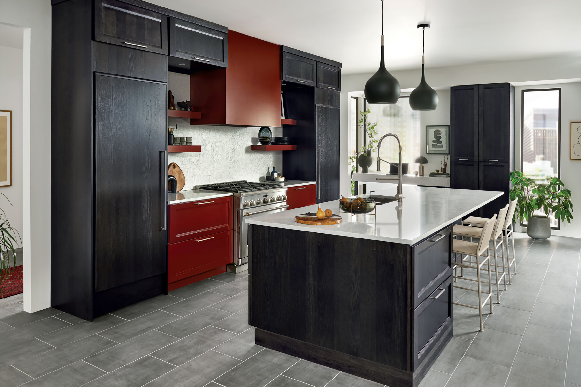 Modern-style, two-tone kitchen with two built-in refrigerators fitted with decorative appliance panels finished in Slate stain to match surrounding KraftMaid cabinetry