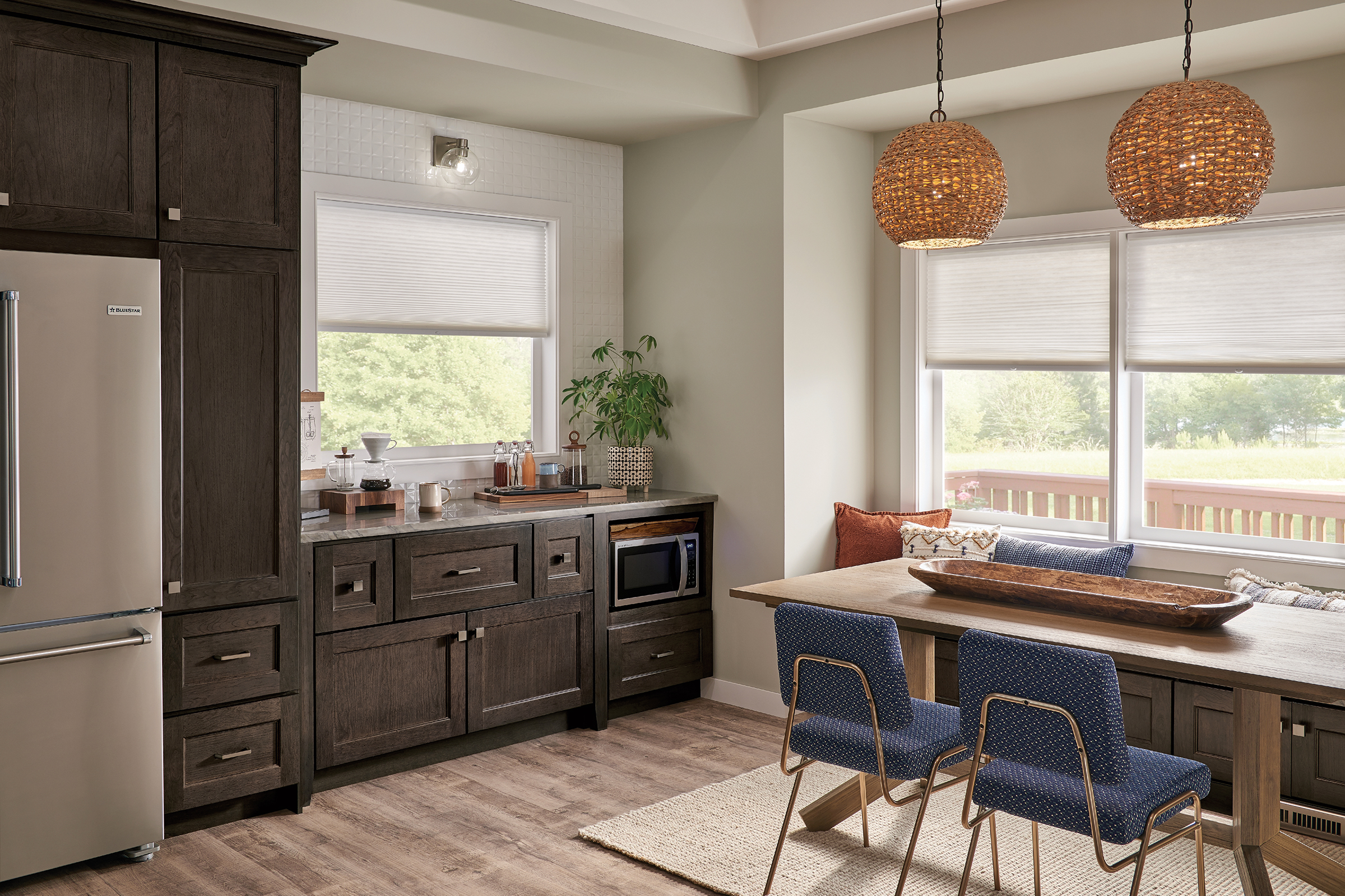 Transitional kitchen design featuring KraftMaid Cherry cabinets in Weathered Ash Brown finish