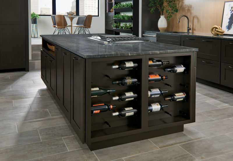 Kitchen island in dark KraftMaid Riverbed paint