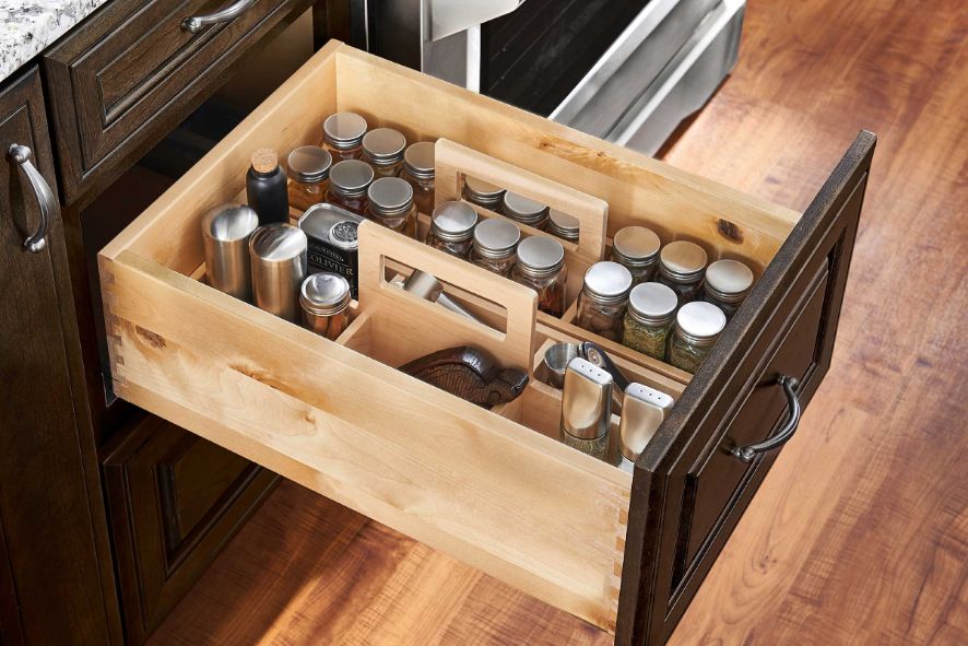 Kitchen organization with KraftMaid spice drawer insert kit. 