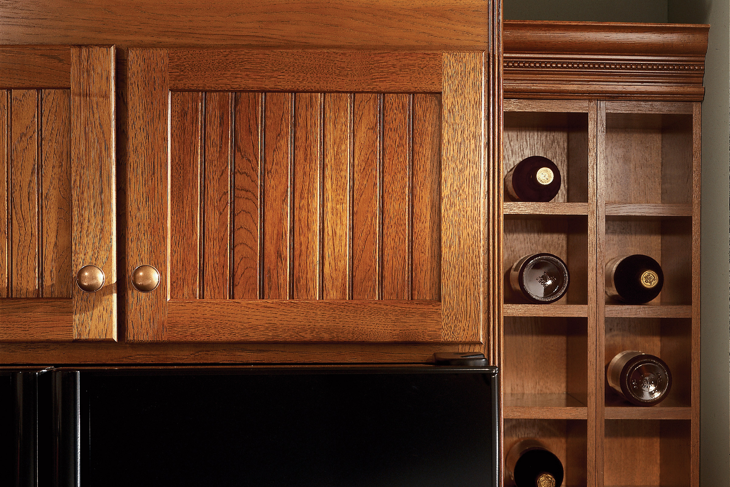 KraftMaid wall wine racks in a kitchen